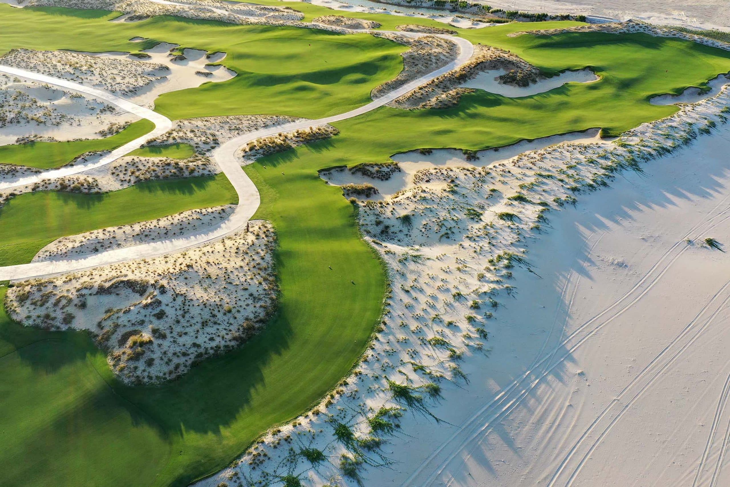 Aerial view of Hoiana Shores' coastal links fairways and dunes, Vietnam